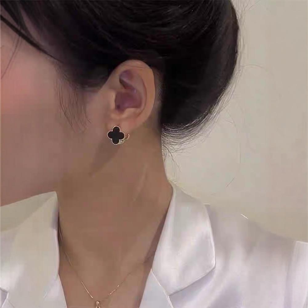 2025 Clover Reversible Stud Earrings: Elegant French Fashion Ear Cuffs & Niche Design Trend.