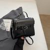 Trend niche high-end sense solid color versatile portable small square bag women's commuting simple oil wax leather messenger bag