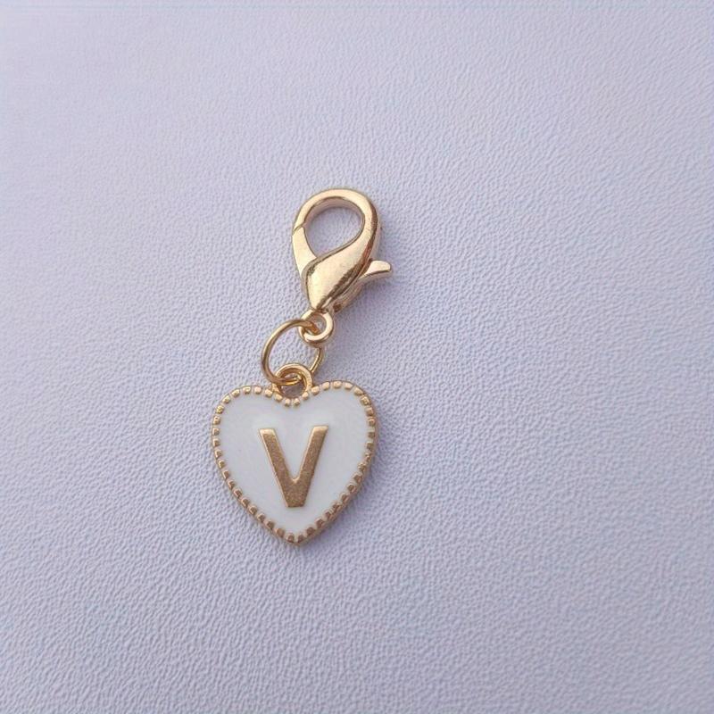 Hetsäljande 26 engelska bokstäver vit dubbelsidig persikohjärta nyckelring hjärtformad legeringsaccessoarprydnad