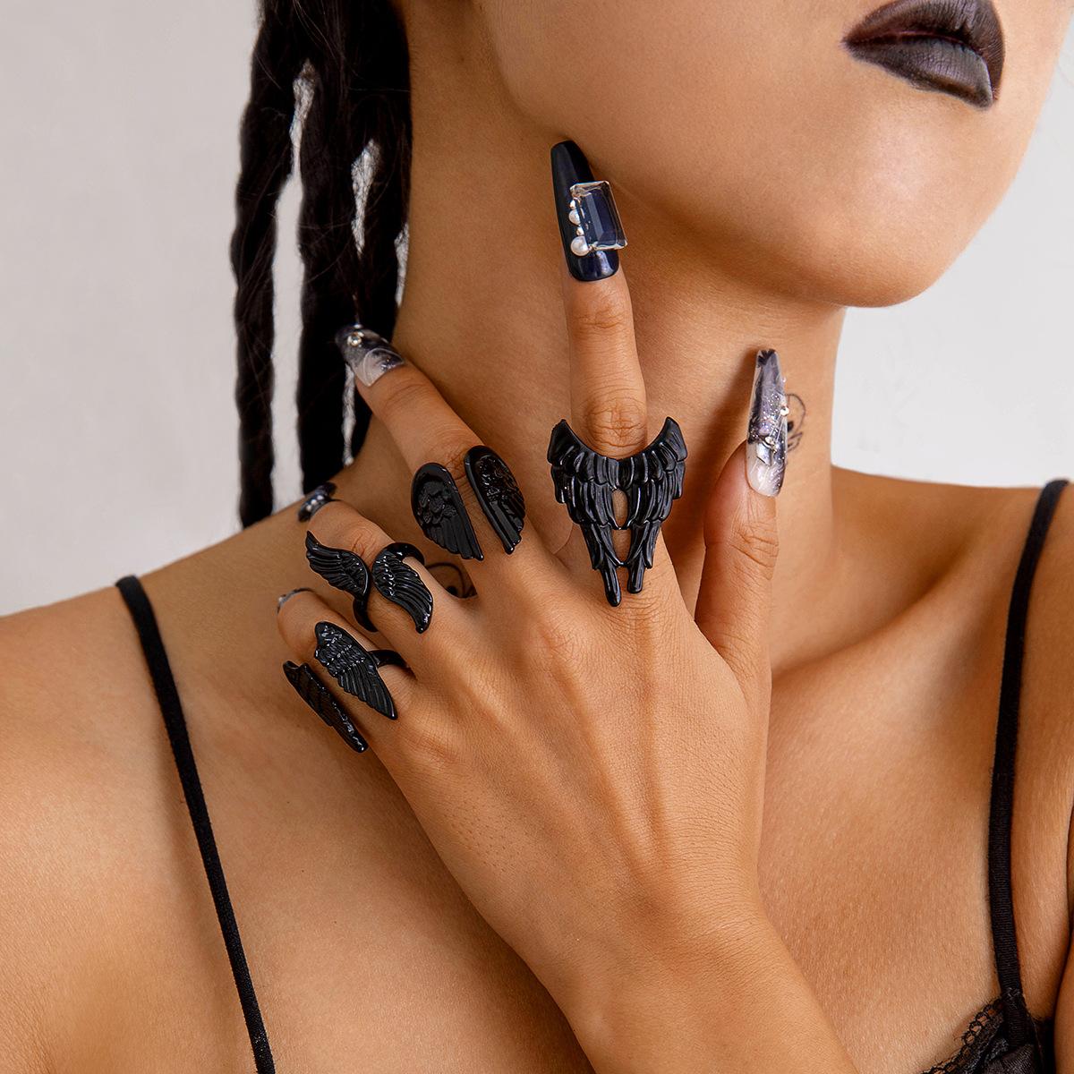 

European and American dark angel wing rings punk style vintage feather articulated rings four-piece set for women