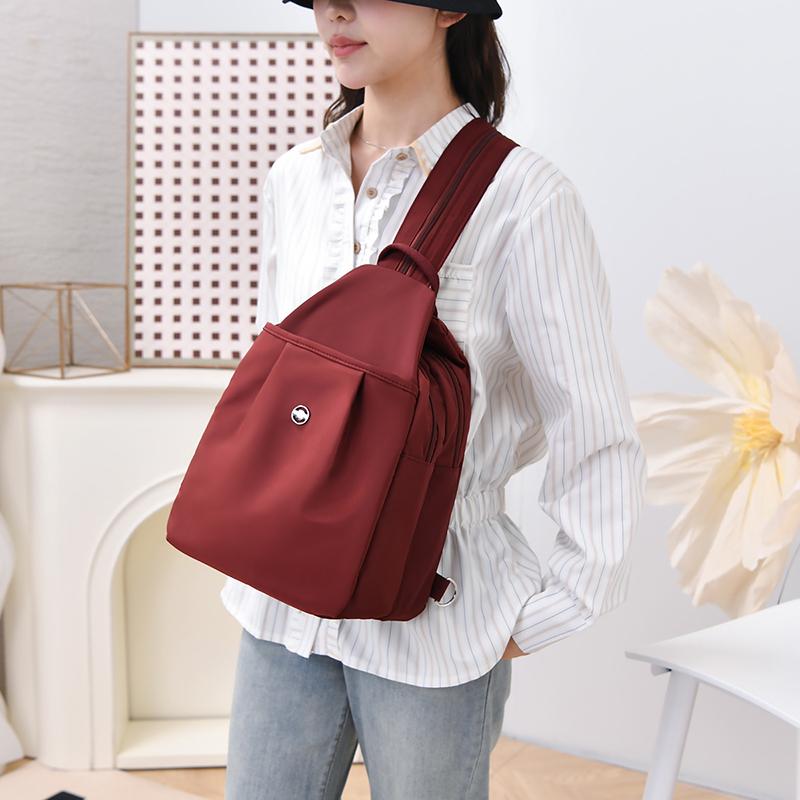 Compact Backpack with Adjustable Straps and Front Zipper Pocket