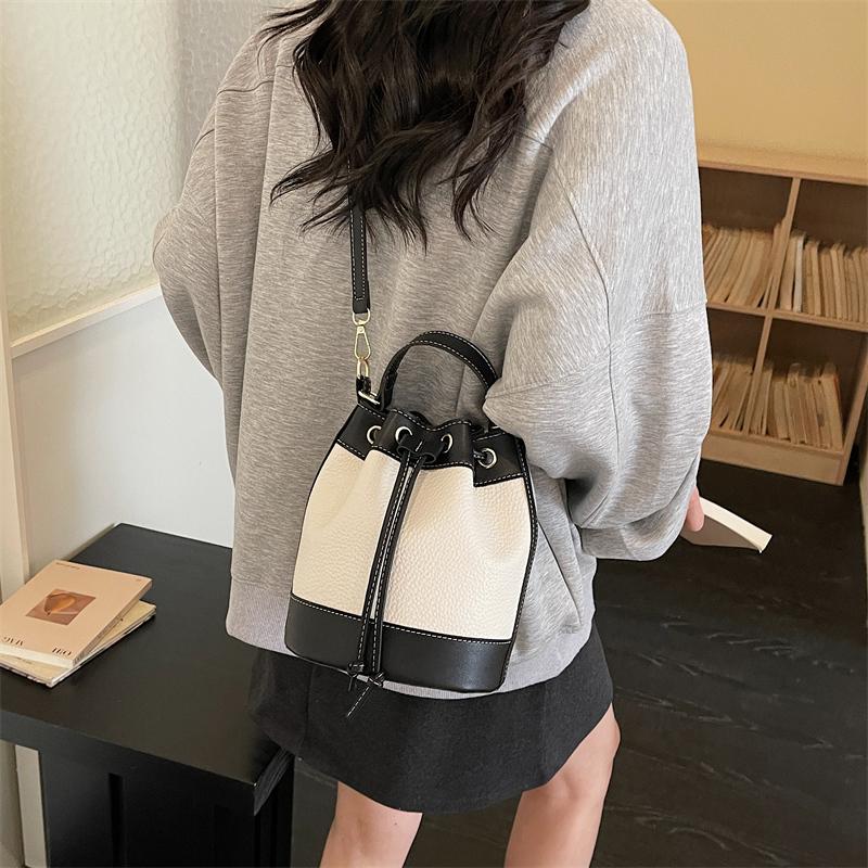 2026 New Arrival Two Tone Bucket Bag for Women Drawstring Closure Top Handle Crossbody Bag with Detachable Strap Trendy Fashion