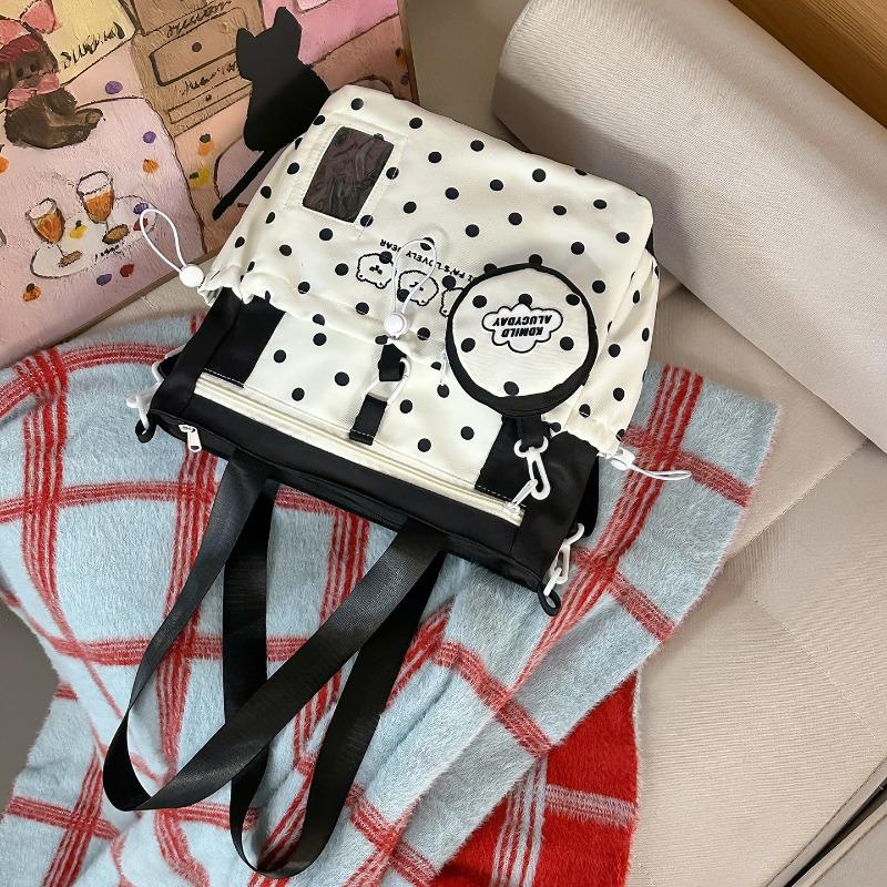 

School bag women s new college style Japanese fresh cartoon polka dot backpack junior high school students lightweight travel backpack