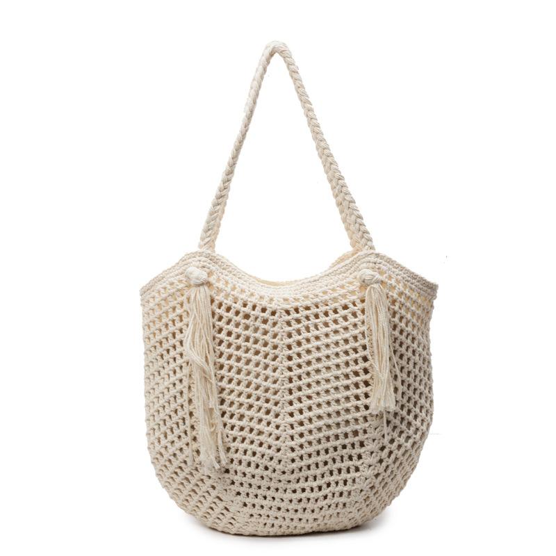 Borsa tessuta di grande capacità nuova borsa di paglia traforata borsa a tracolla stile pigro borsa da spiaggia primavera ed estate borsa da donna