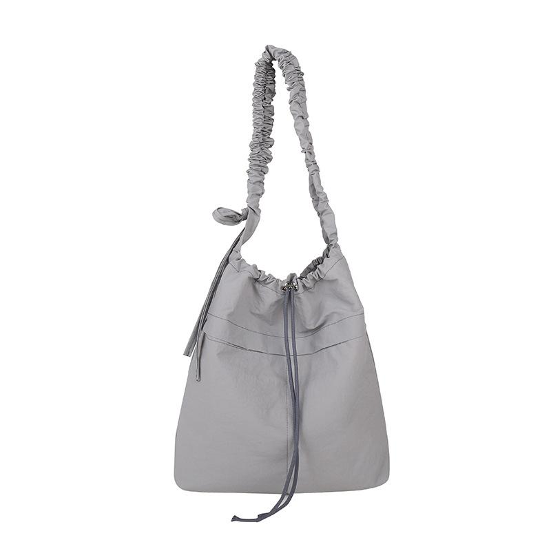 New Large-capacity Drawstring Bucket Bag Women's Leisure Commuter Shoulder Messenger Bag