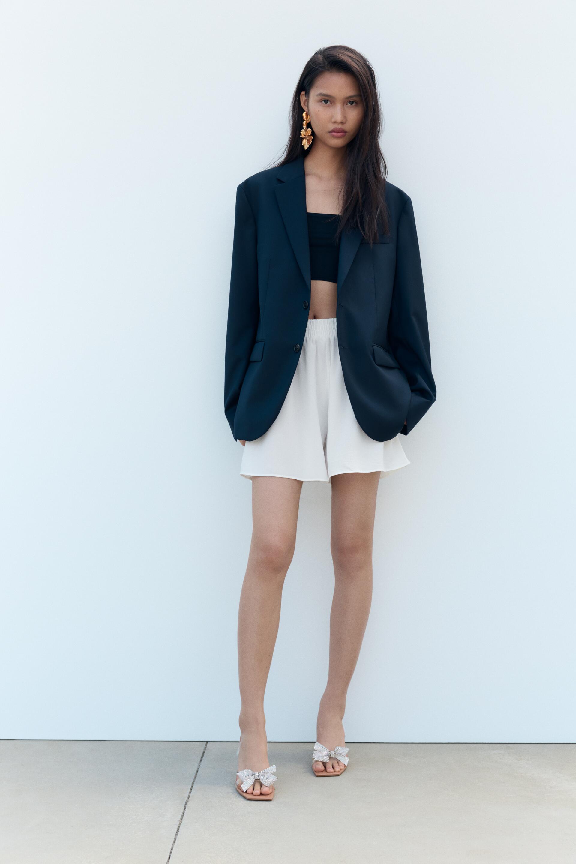 

ВИНИЛОВЫЕ САНДАЛИИ НА КАБЛУКЕ С БАНТОМ