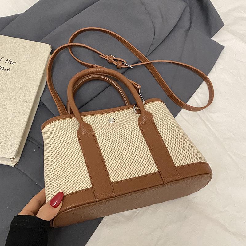 

Весна новая мода контрастная цветная вставка портативная сумка-ведро женская повседневная рабочая сумка-мессенджер с ветром