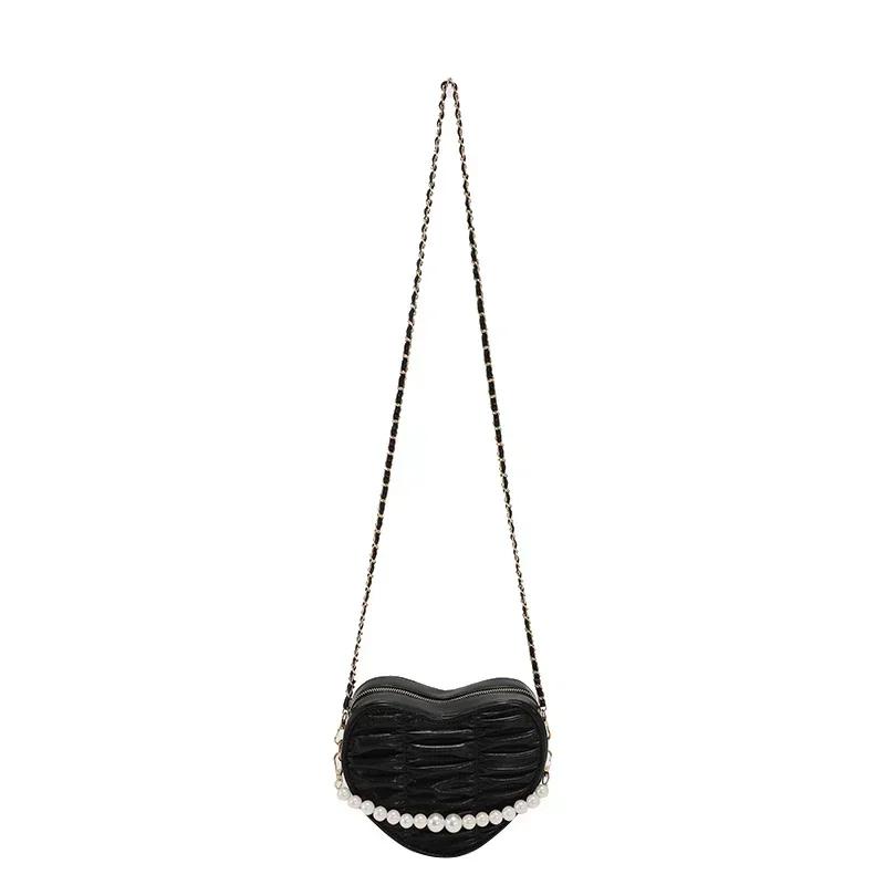 Heart-shaped solid chains shoulder bags classic fashion style sense of luxury popularity crossbody bags