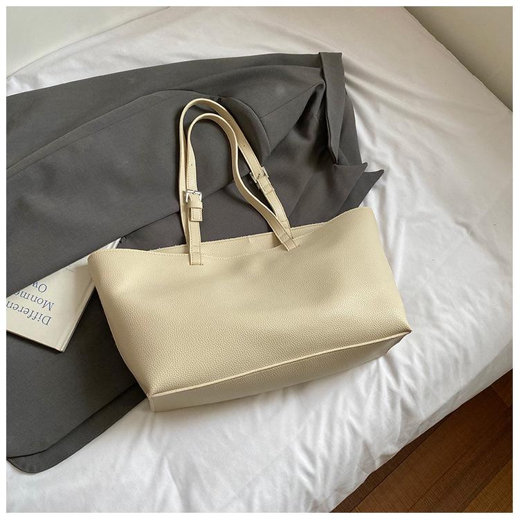 

Korean version shoulder bag large-capacity women s high-value 2025 summer new foreign-style portable commuter wind tote bag women