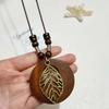 New Chinese retro Zen leather rope necklace autumn and winter bohemian ethnic wind leaf long sweater chain