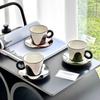 Schwarz und Weiß Wellenförmige Keramik Kaffeetasse Schmetterlings-Set Unterglasurfarben Handwerksbecher Latte-Tasse Leichter Luxus-Stil
