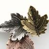 Women Brooch Retro Festival Elegant Geometric Electroplating Christmas Decoration Gifts Three-color Maple Leaf Collar Lapel Pin Fashion Jewelry New