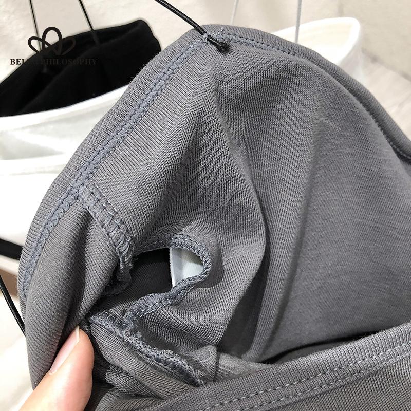 Wewnętrzna kamizelka z kamizelką, wiosenna koszula z podszewką, damska zewnętrzna, nosząca biały piękny pasek z napierśnikiem, owinięty top