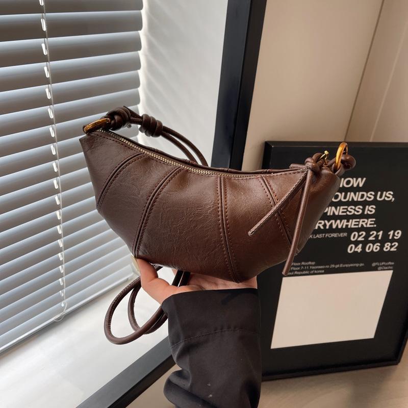 

Нишевая сумка-круассан женская новая универсальная повседневная сумка-пельмень модная на плечо мессенджер темно-коричневого