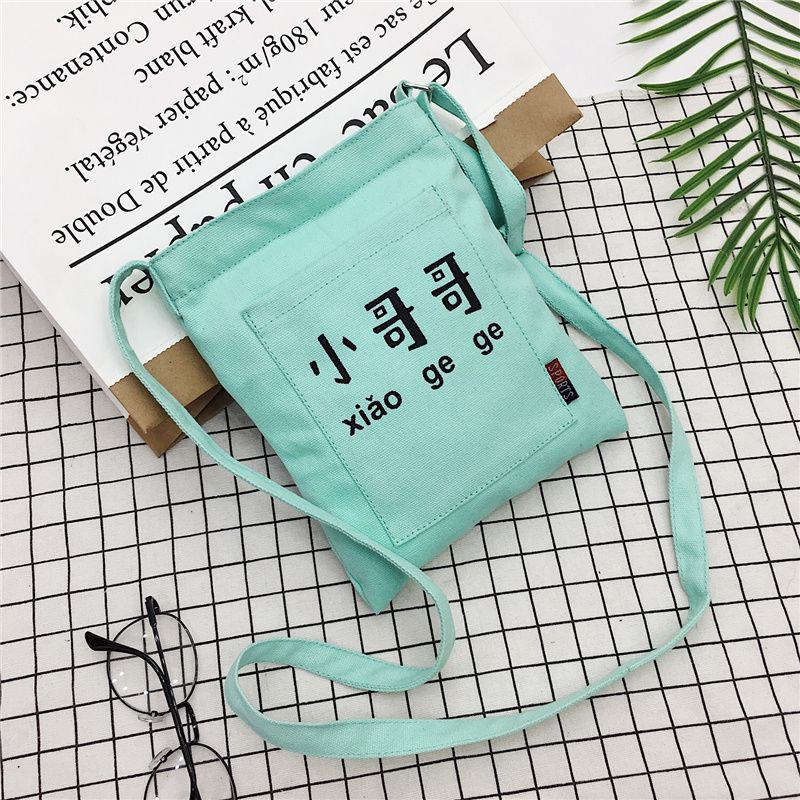 

Miss shoulder messenger bag female student mini cute canvas bag Korean version multi-color optional cute sister college A