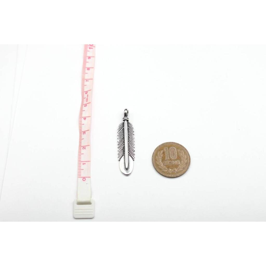 Used Brand new unused Navajo feather necklace top with sterling stamp