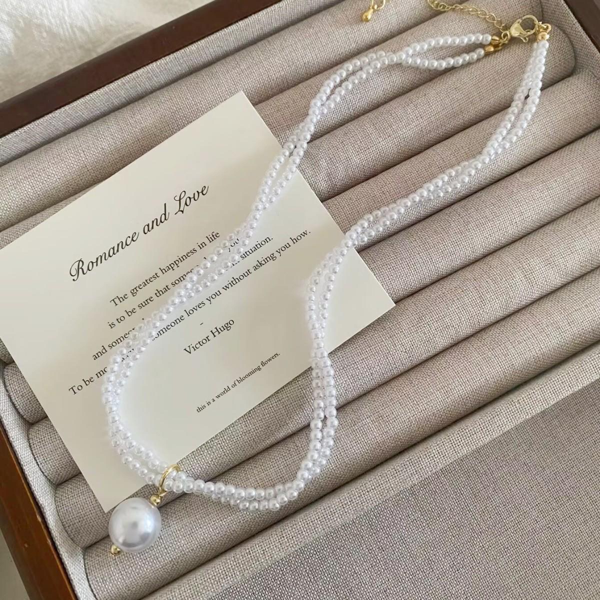 Elegant Double Layer Twisted Pearl Necklace - Stylish and Sophisticated Statement Piece