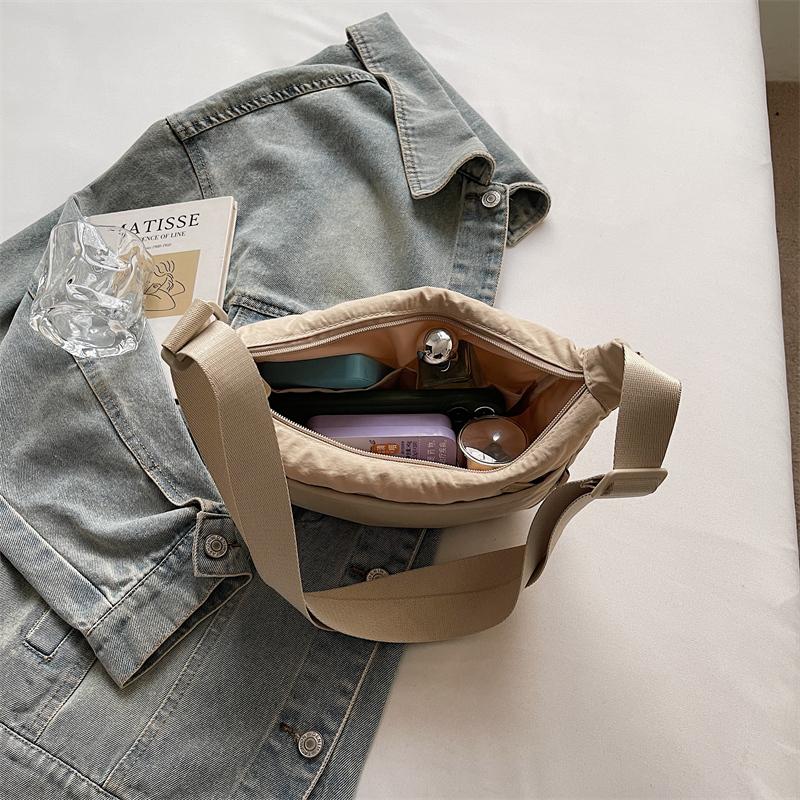 Minimalist Crossbody Bag with Adjustable Strap and Front Zip Pocket Lightweight Everyday Shoulder Bag