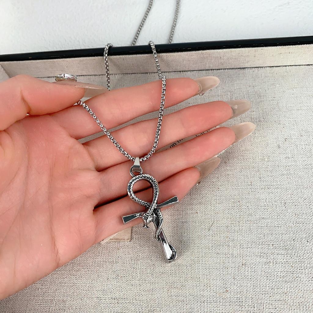 Retro snake-shaped cross pendant necklace, European and American fashion long collarbone chain, niche personalized design item