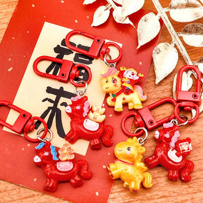 1/7 Stück Cartoon Jahr des Pferdes Schlüsselanhänger Niedlicher Harz-Pony-Schlüsselring Taschendekoration Zubehör Jahresanhänger Kleine Geschenke