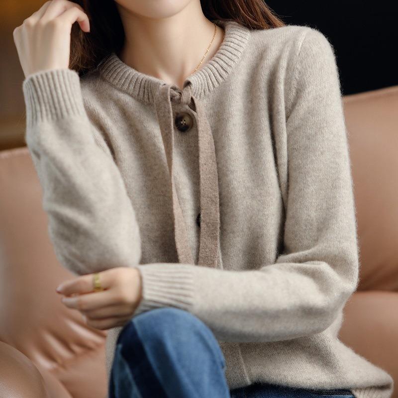 Autumn and winter new knitted cardigan women's single-breasted outer sweater loose round neck tether wool knitted sweater jacket tide