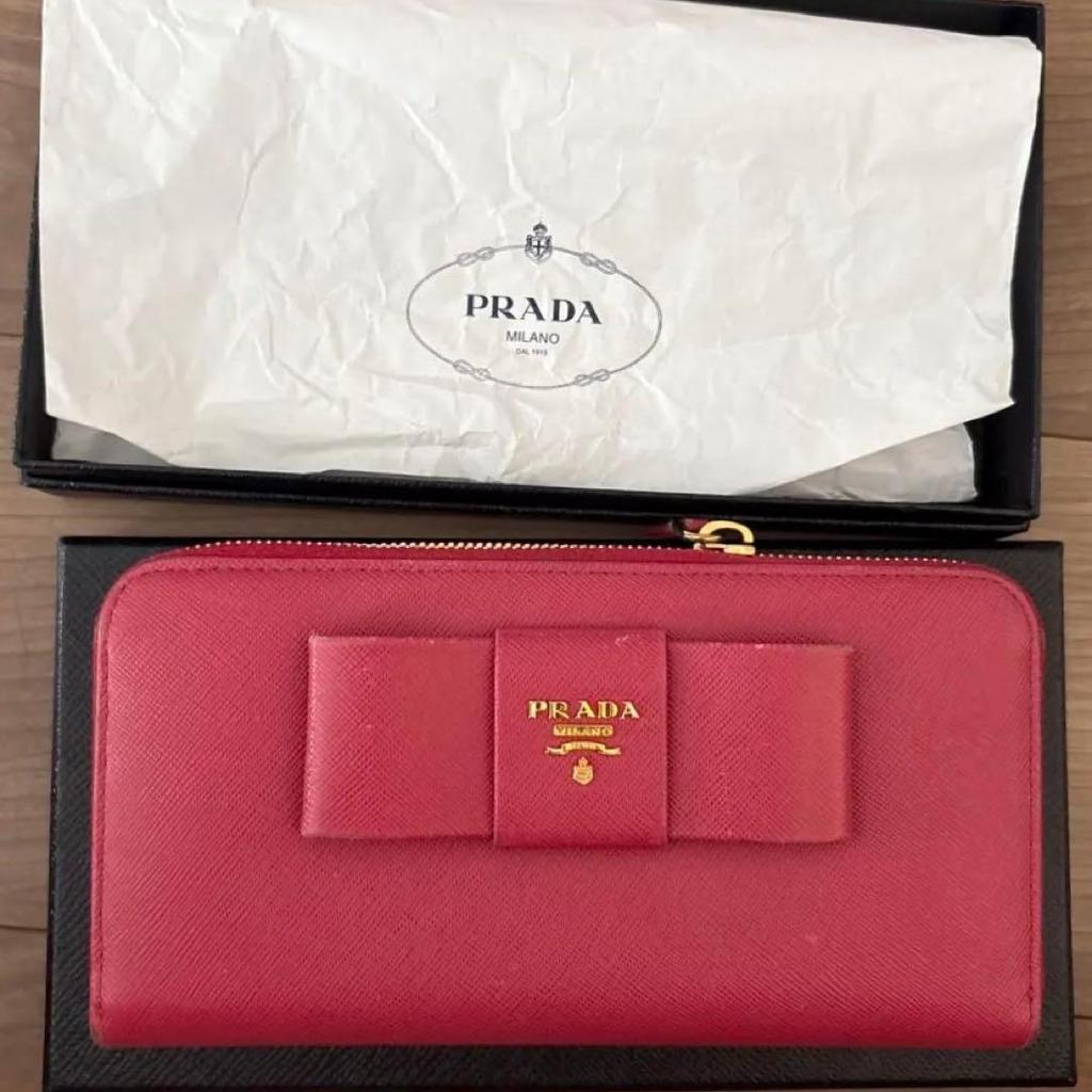 Used PRADA long wallet ribbon round zipper
