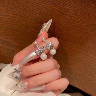 Korean Zircon Bow & Pearl Earrings - Exquisite, Luxurious, and Versatile High-End Accessories