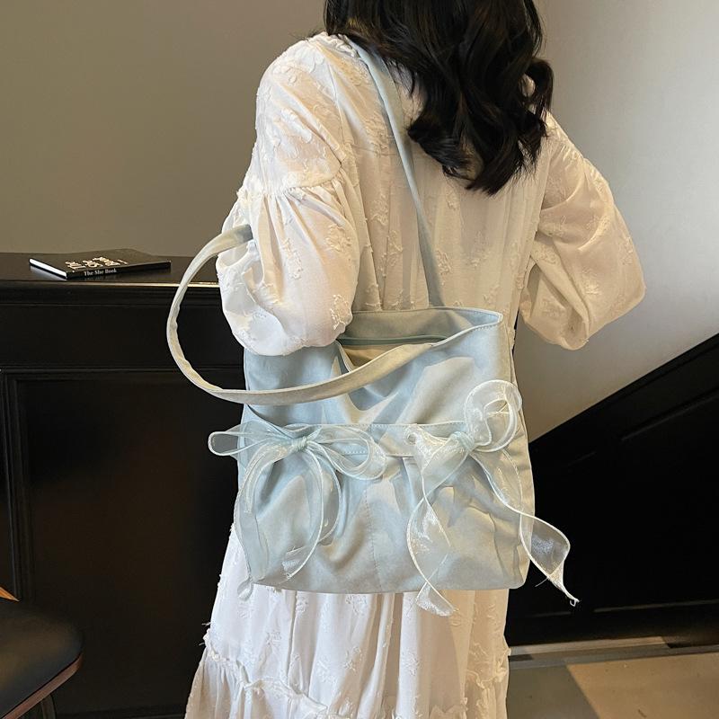 Korean version of fashionable large-capacity underarm commuter bag women's bag 2025 new bow tote bag shoulder bag