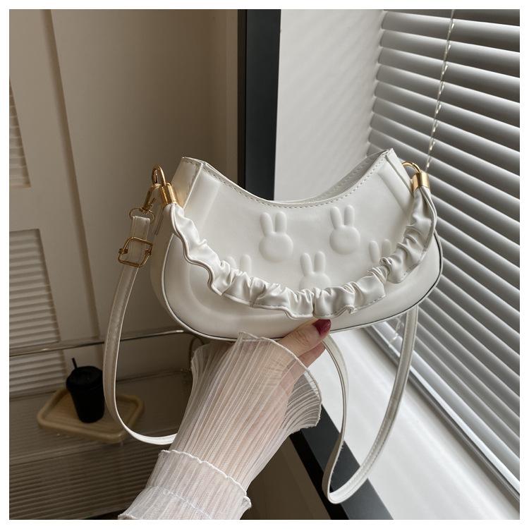 

Simple fashion indented shoulder bag 2025 new soft handle women s bag temperament hand bag candy color casual messenger bag