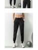 2021 Spring Women's Breathable Loose Fit Nine-Point Running Pants with Pockets