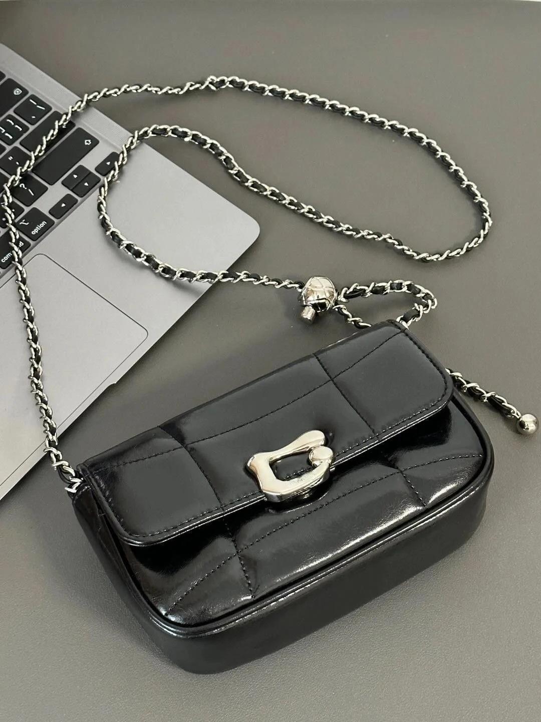 

Сумка женская 2024 года, новинка, тренды, нишевый дизайн, цепочка, подмышечная сумка, наплечная текстурированная маленькая сумка, косая сумка Span чёрный