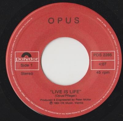 7inch Record OPUS - Live Is Life/ She Loves You PDS2285 POLY DOR 1985 Canada Rock Used