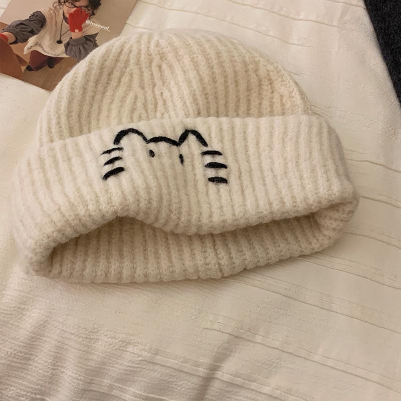 Cute cat embroidery blue knitted women's new sweet and versatile face small warm ear protector wool hat