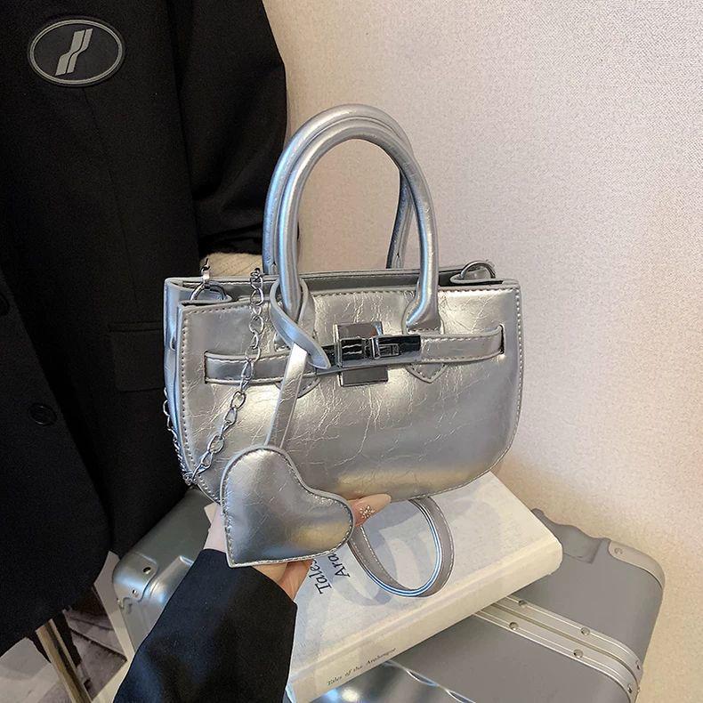 

Корейский Нишевый 2025 Женская Мода Универсальная Сумка Кроссбоди в Стиле Биркин серебряный