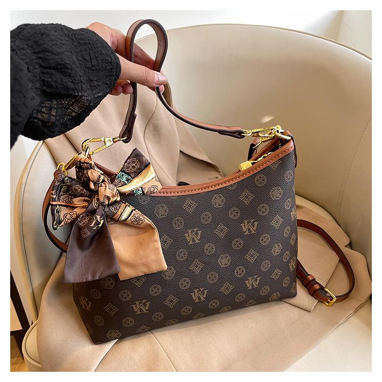 Premium väska dam 2024 ny trendig mode retro tryckt tygväska stor kapacitet mångsidig axel messenger väska