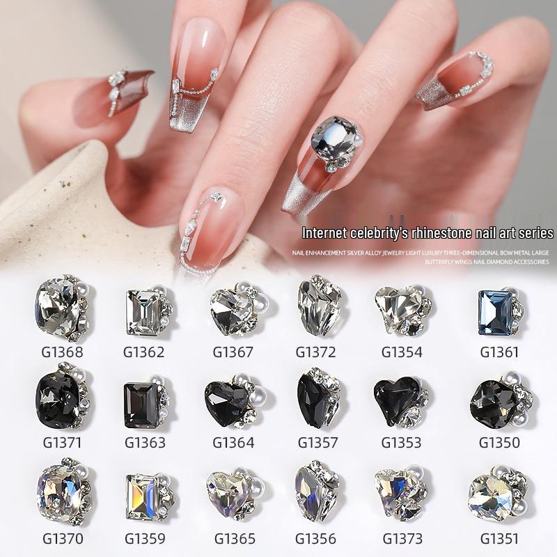 

Trendy Nail Art: Shiny Stacked Diamond & Pearl Heart Designs