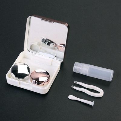 Recipientes e pinças para lentes de contacto