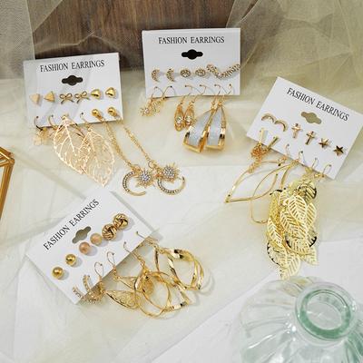 Trendy Metall Hohle Blätter Lange Tropfen Ohrringe Liebe Sterne Mond Ohrstecker Set Damen Schmuck