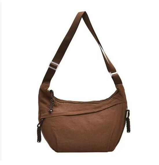 

Trendy Lightweight Nylon Women s Crossbody Bag – Versatile, Simple, Solid Color, Perfect for Daily Commute 37x5x22 cm коричневий