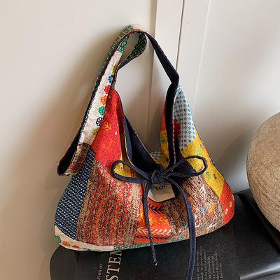 Diese große Tote Bag ist eine leichte, lässige und künstlerische Damen-Umhängetasche