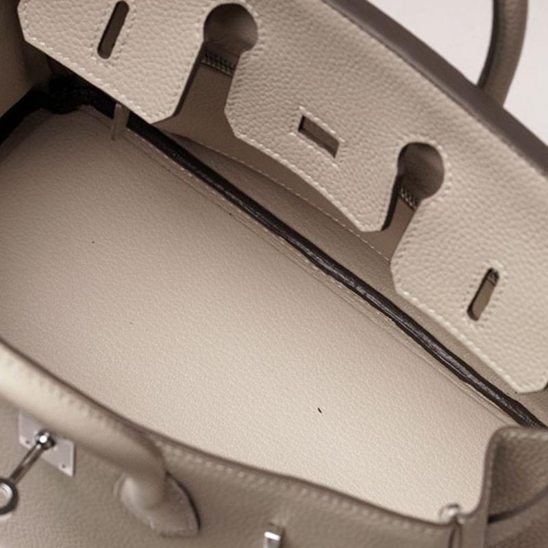 Høykvalitets spesiallaget semi-vokset tråd semi-håndsøm stålbeslag importert togo toppnarvet kuskinn håndveske med en følelse av luksus