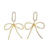 European and American style simple zircon bow earrings, gold high-end diamond-set fringed earrings, high-luxury earrings.