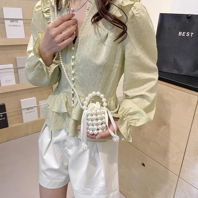 Mori cute imitation pearl woven mini compact women's earphone mouth red envelope spring new shoulder messenger bag