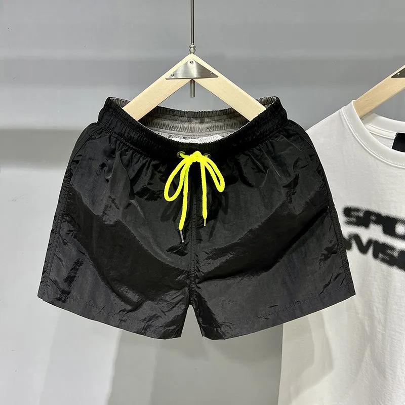 

Мужские спортивные повседневные быстросохнущие брюки длиной три четверти для повседневного спорта, бега, пляжа XS чёрный