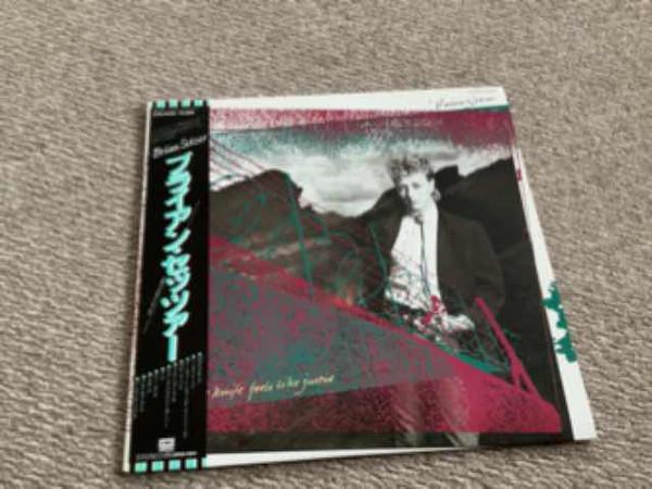 

LP Record BRIAN SETZER - Knife Feels Like Justice EYS91162PROMO EMI AMERICA 1986 Japan Rock Used