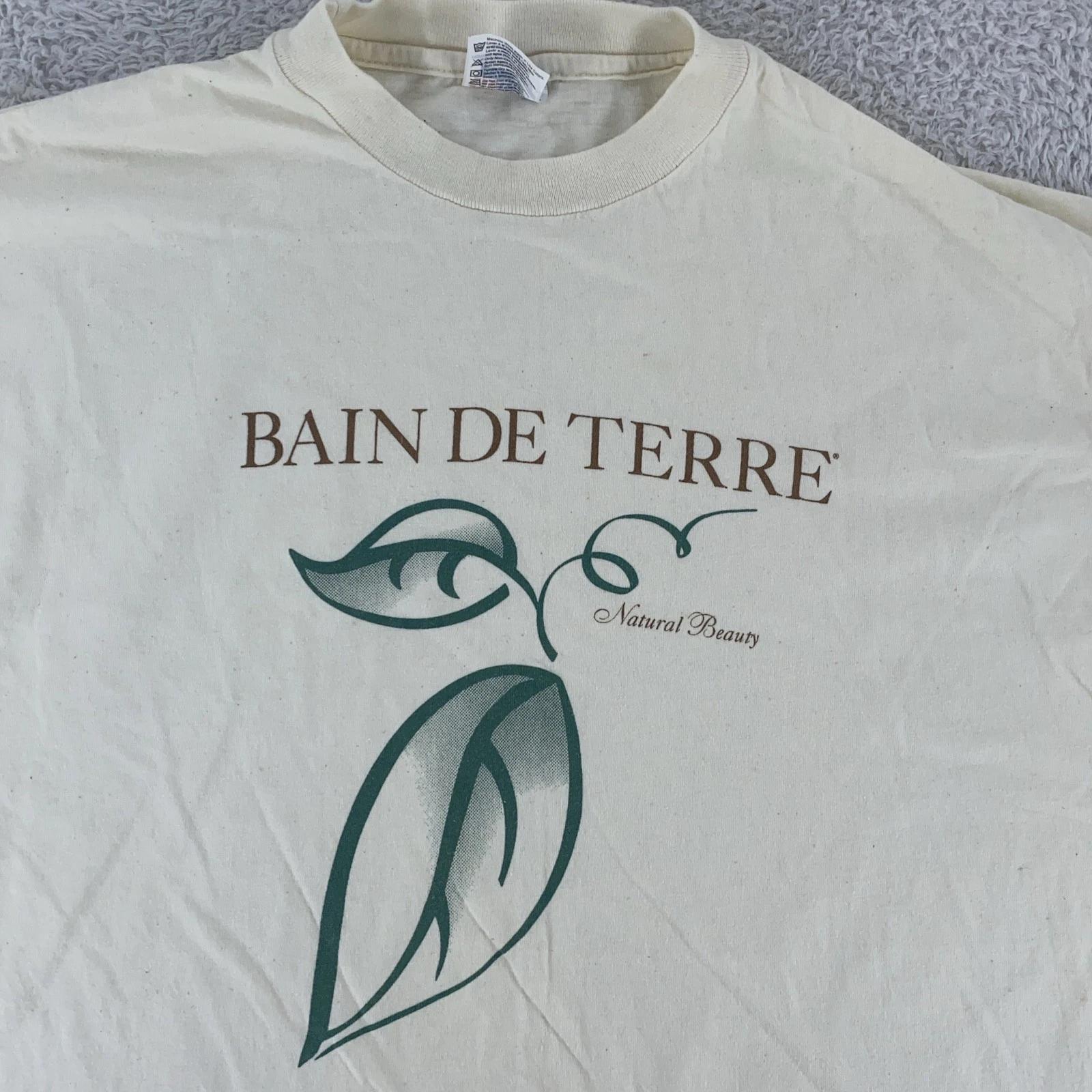 

Vintage Bain De Terre Shirt Mens L/XL Natural Beauty Cream Made USA M