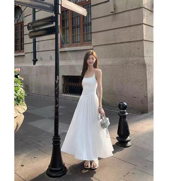 Solid color dress women's new Korean gentle suspender holiday style sweet skirt waist thin temperament long dress