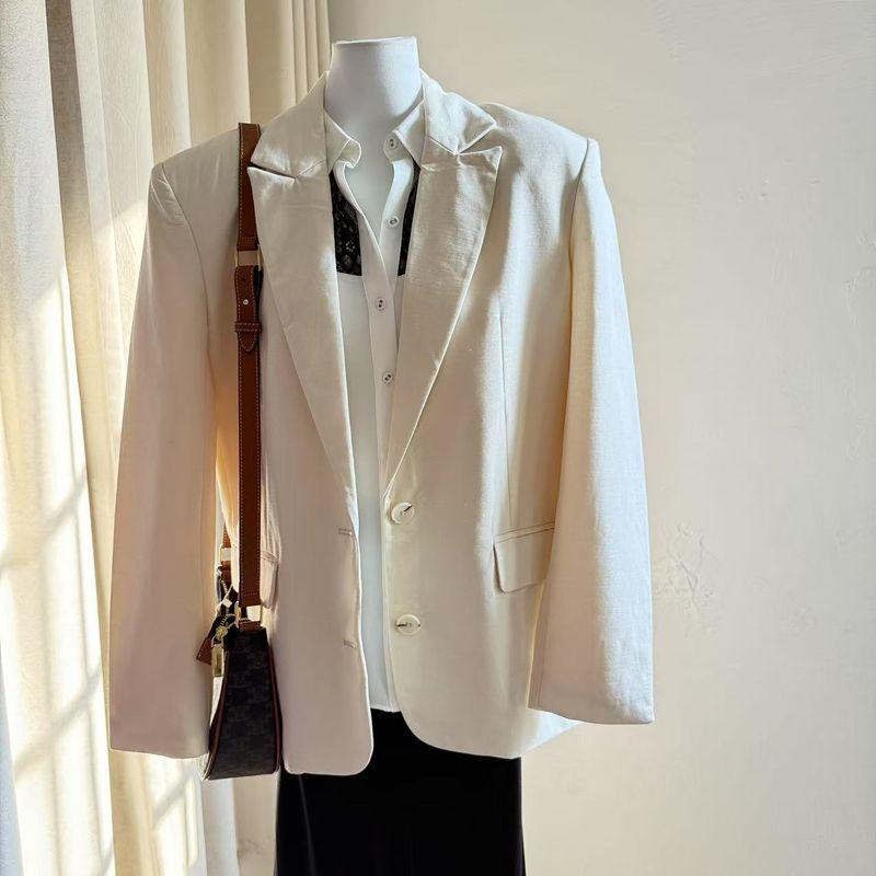 

Маленький костюм из смесового льна с синим клетчатым принтом Beige L