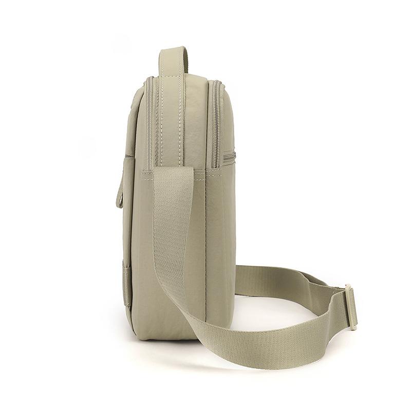 Nylonová crossbody taška s horním uchem a přední kapsou na zip pro muže i ženy pro každodenní použití