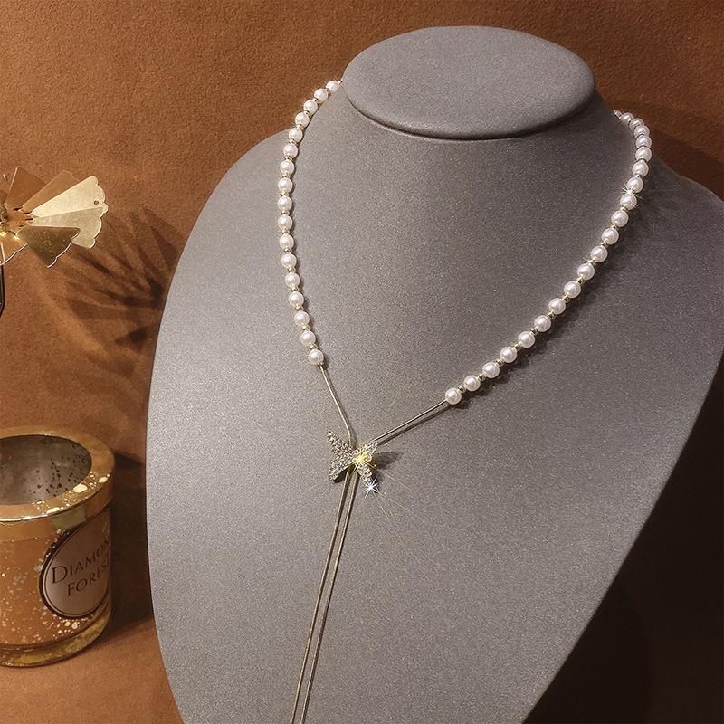 Long butterfly pearl necklace ins wind adjustable tassel pendant collarbone chain light luxury neck chain chain